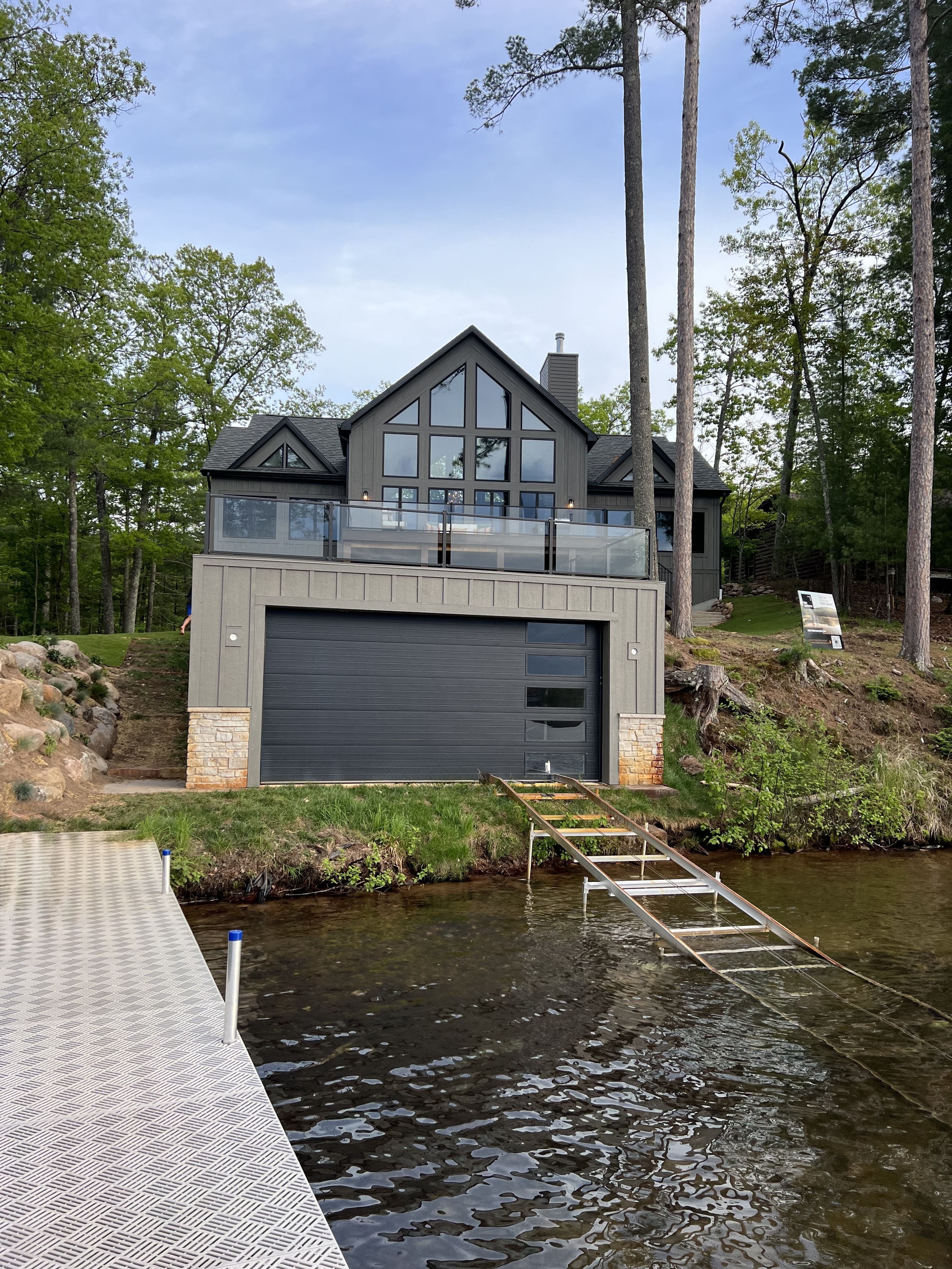 Before - Minocqua boathouse with solid garage doors