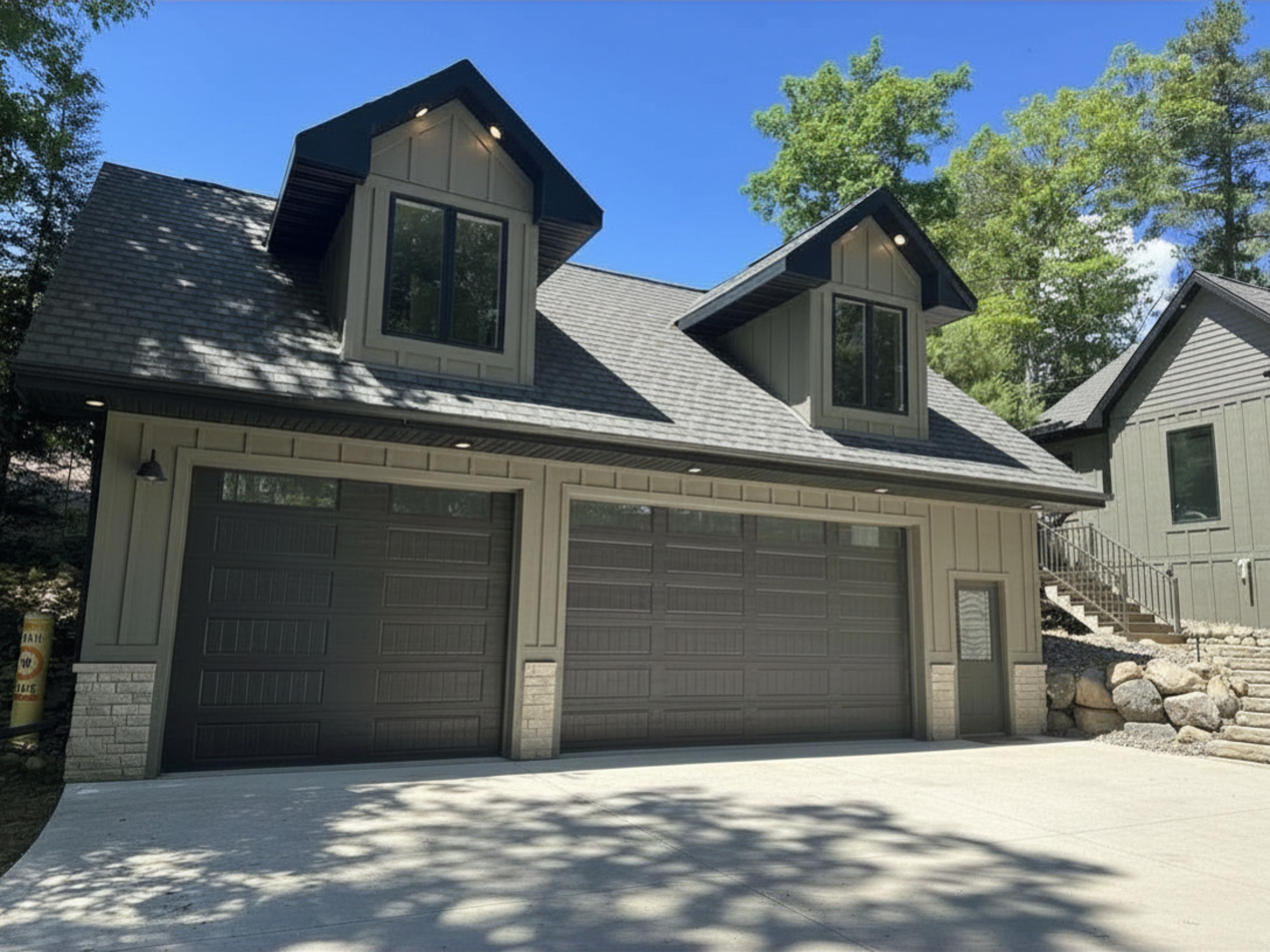 Before - Minocqua lake house garage with original doors