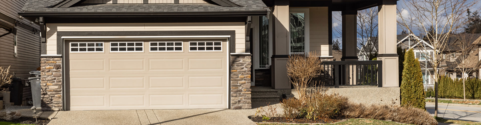 Residential home with garage doors