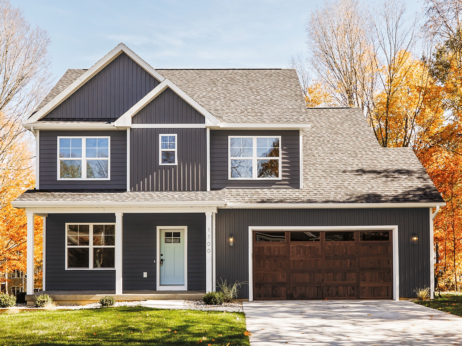 Residential home with garage doors