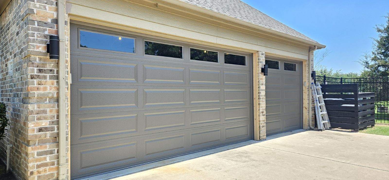 Residential home with garage doors