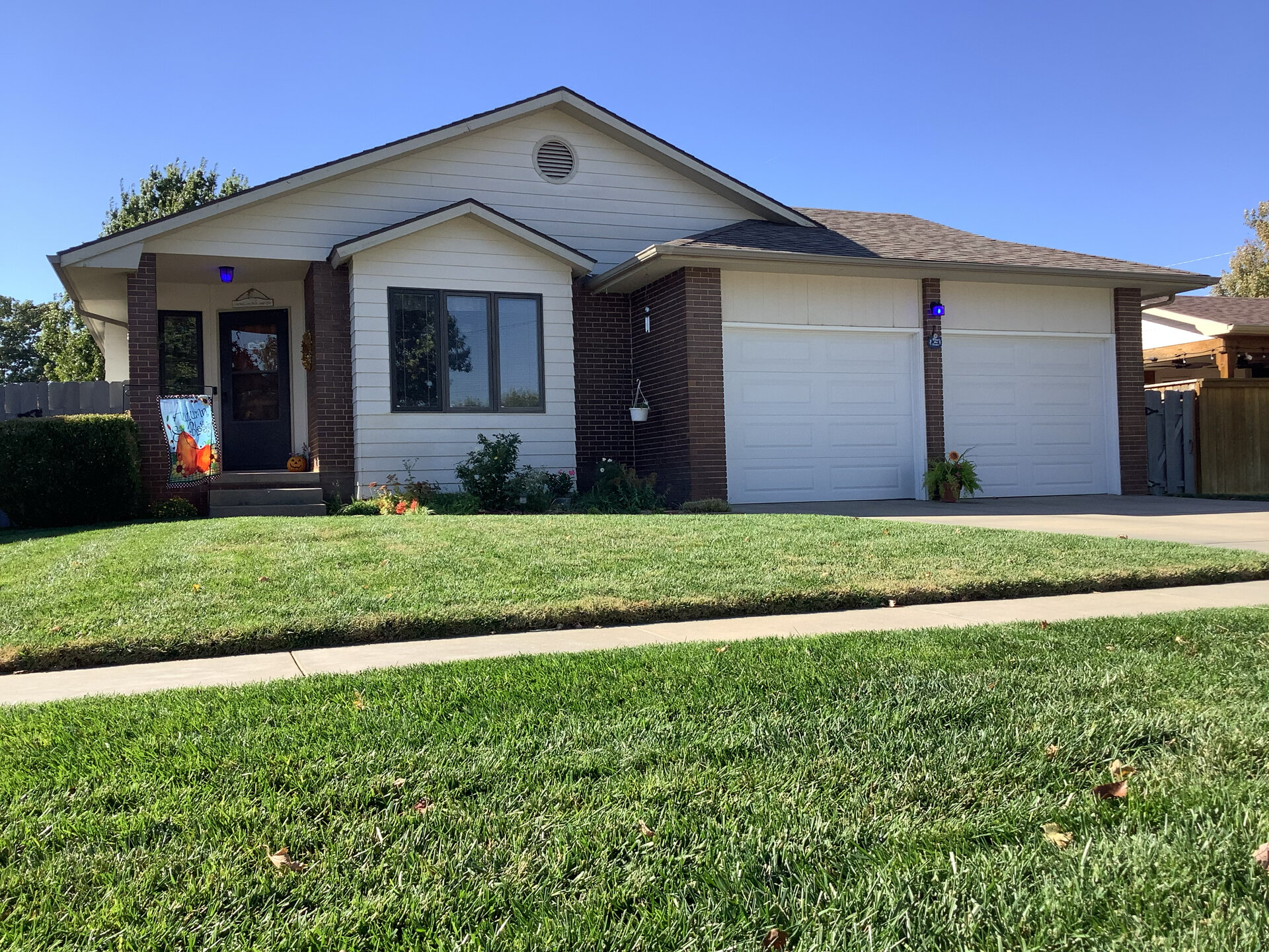 Residential home with garage doors