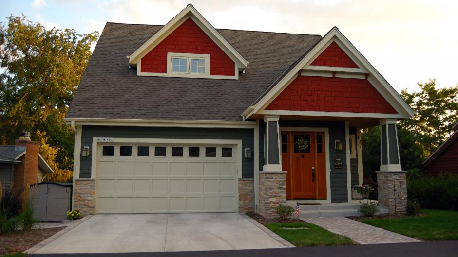 Residential home with craftsman-style garage door
